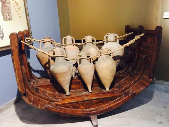Greek amphorae arranged in a reconstructed ship in the Archaeological Museum of Varna